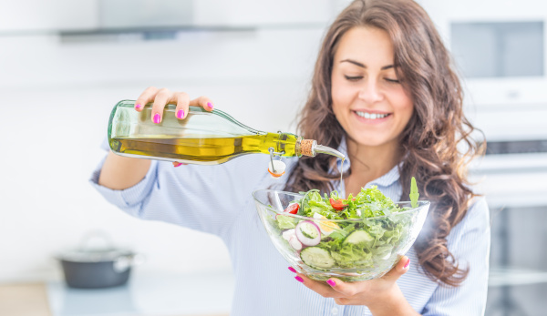 Meditteranean Diet - a bowl of salad with olive oil 