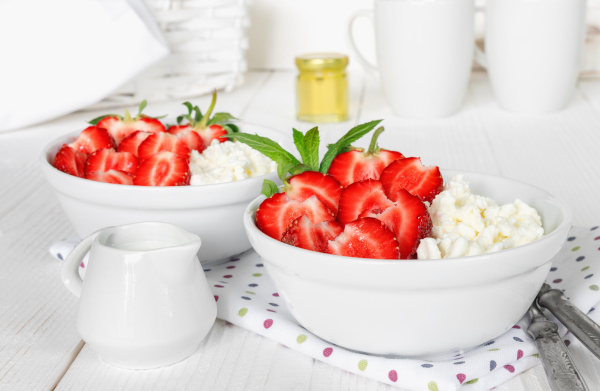 selenium rich foods include cottage cheese - delicious and nutritious served with strawberries